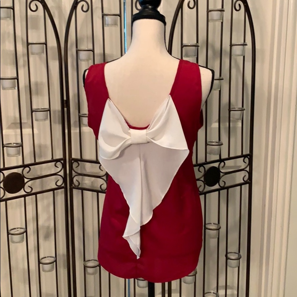 Top with back bow detail